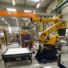 Robot de manutention pour le levage précis et sécurisé de fûts en milieu industriel